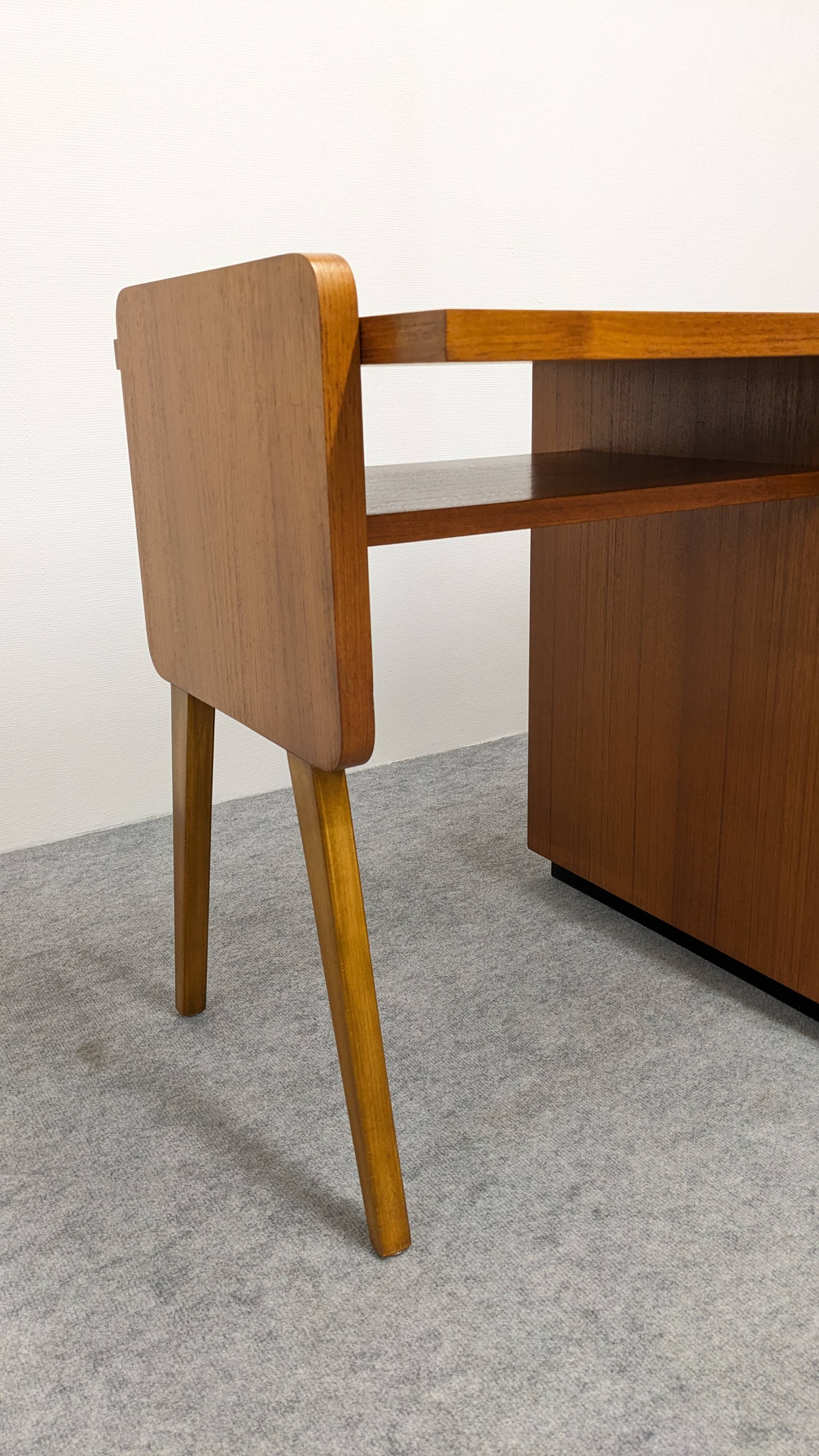 Modernist desk in blonde rosewood, France circa 1960.