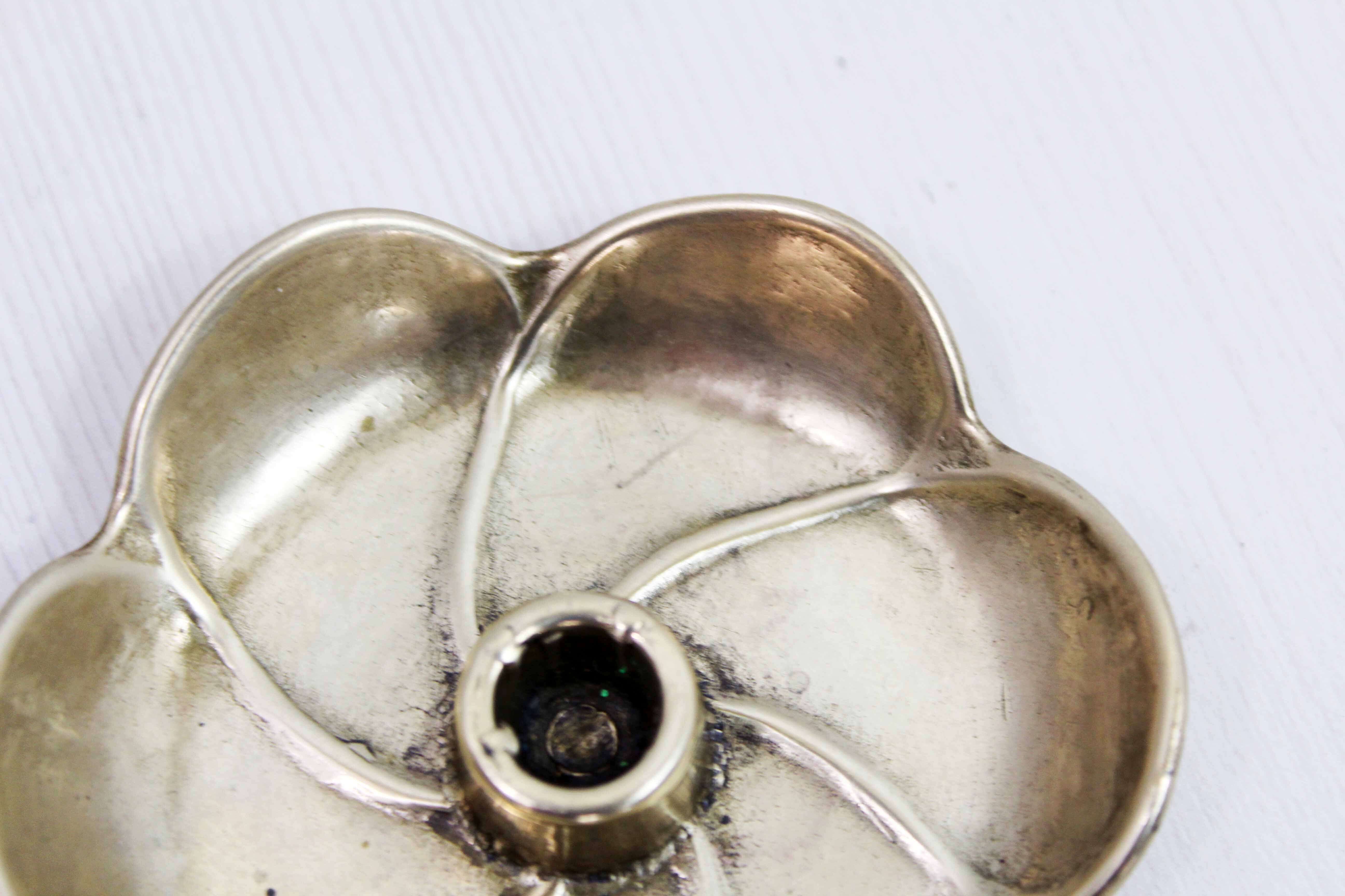 Brass flower candle holder