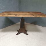 Old table on cast iron machine leg