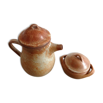 Teapot in reeds and its sugar bowl