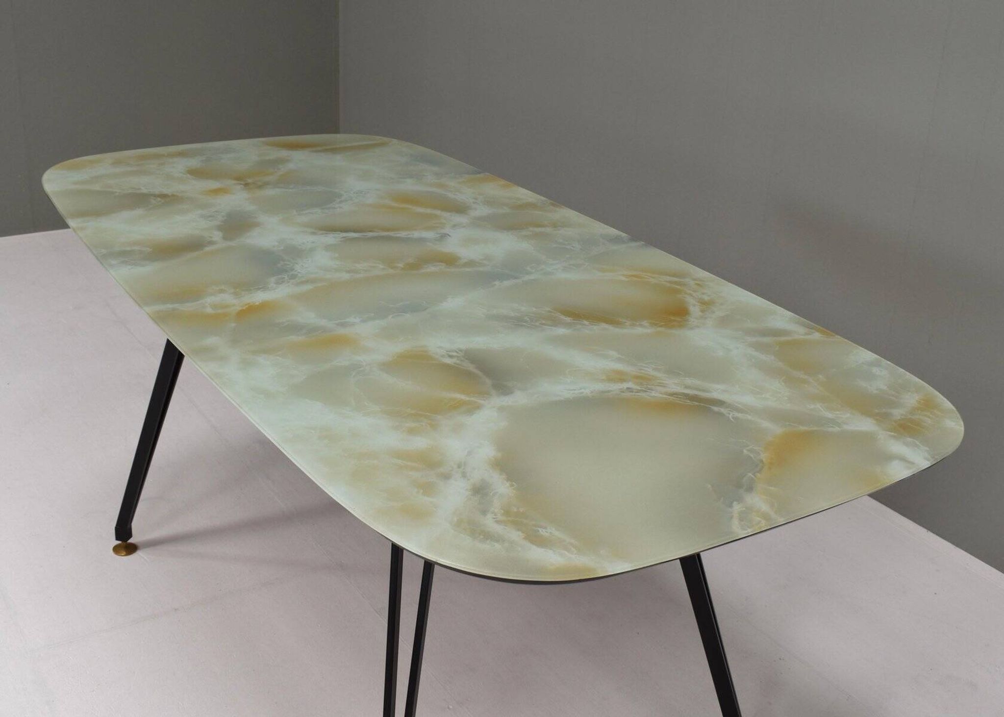 Italian dining table with metal base and glass top and brass, 1950s