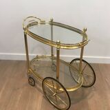 Oval brass trolley from Maison Baguès.