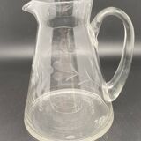 Glass and carafe set with chiseled flower motif