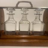 Portable Art Deco liquor cabinet in mahogany & metal with 3 Baccarat crystal bottles.