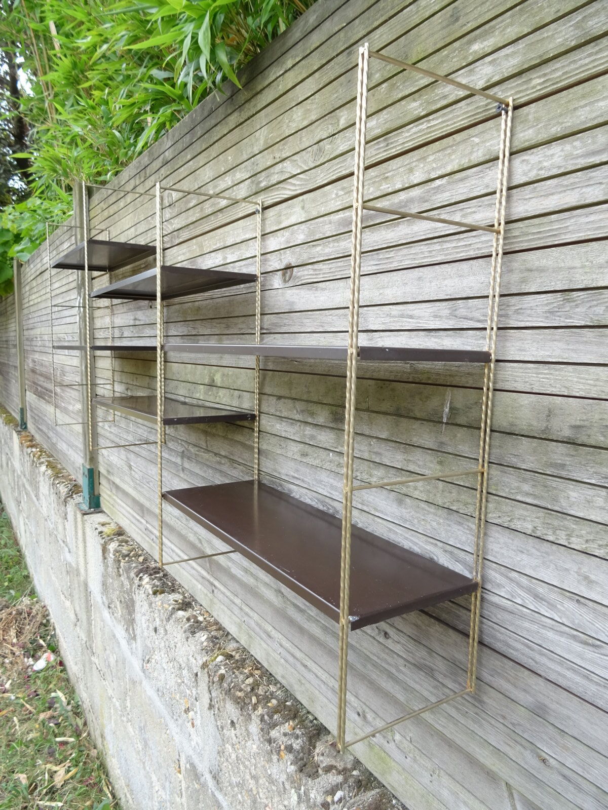 Modular metal string wall shelf