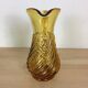 Twisted amber glass pitcher