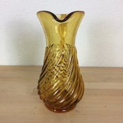 Twisted amber glass pitcher