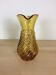 Twisted amber glass pitcher