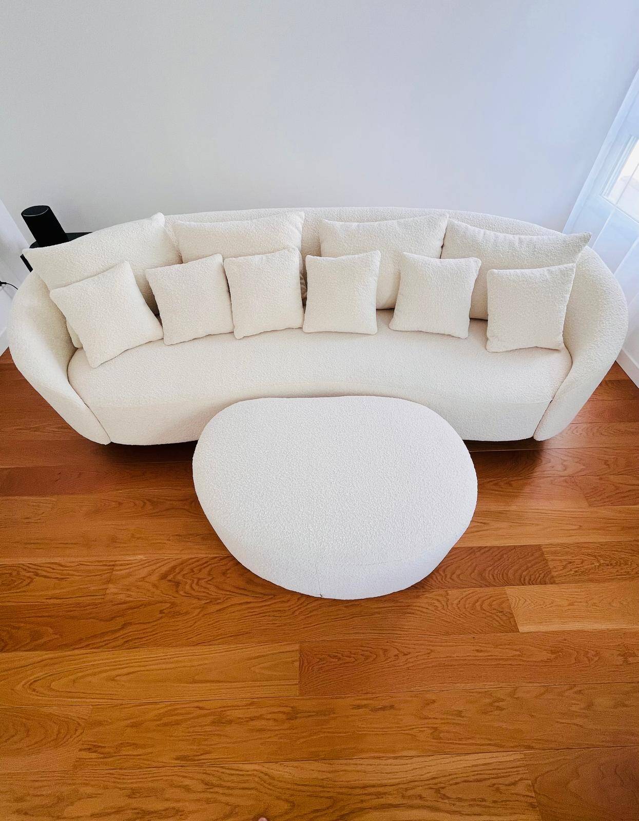 White sofa and pouffe
