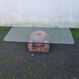 Coffee table with carved wooden base from India, glass top
