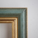 Frame in gilded and green wood