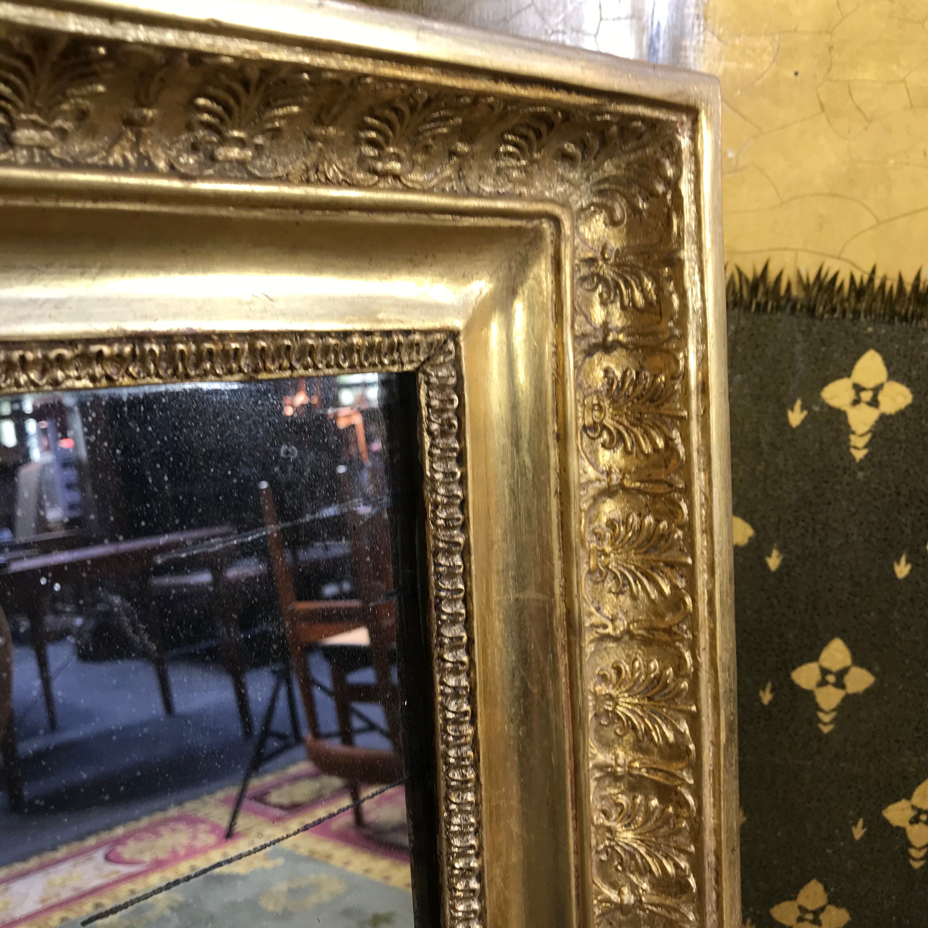 Empire mirror with palmettes gold leaf restored