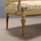 Antique neoclassical canapé in carved wood from the 19th century.