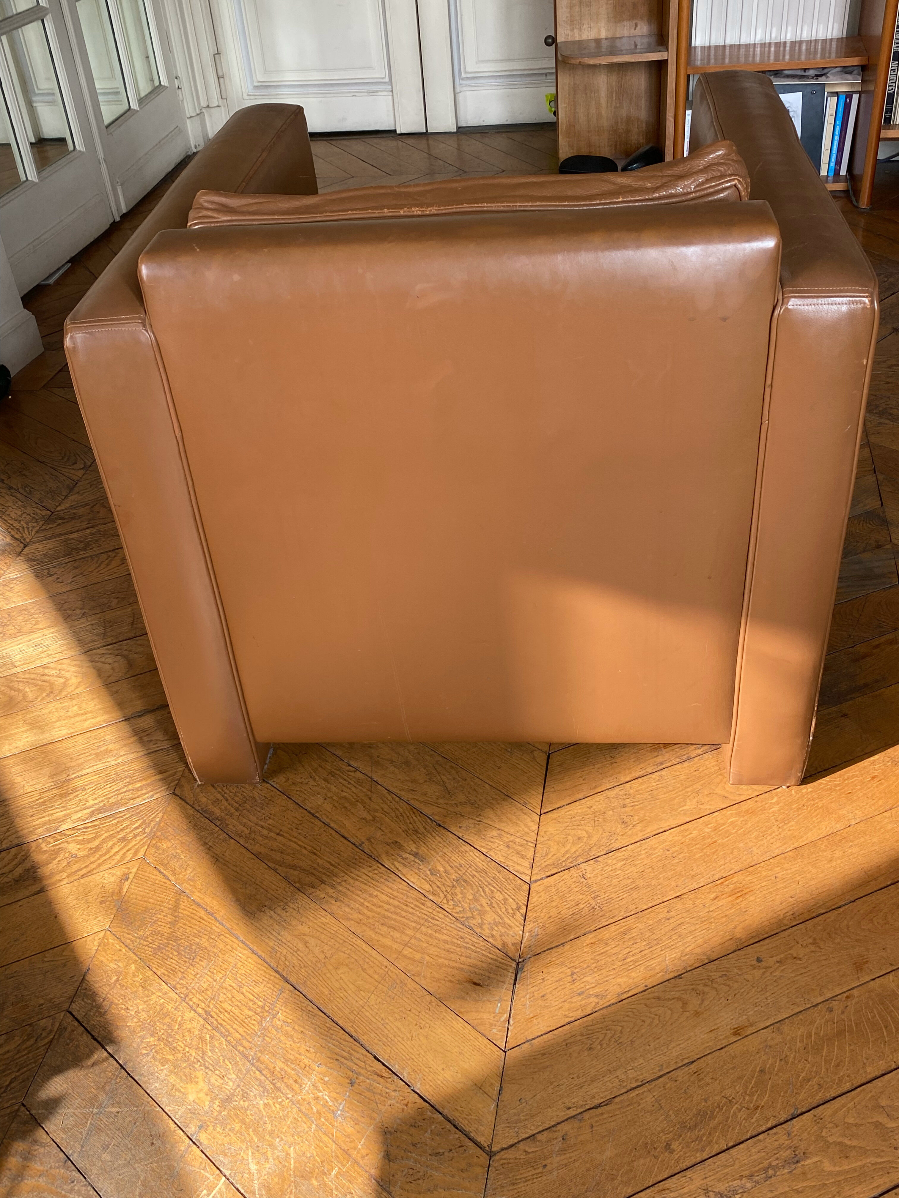 Hugues Chevalier leather armchairs