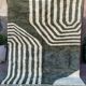 Off-white Moroccan rug with geometric patterns, 160cm x 260cm