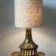 Vintage ceramic table lamp with integrated light base.