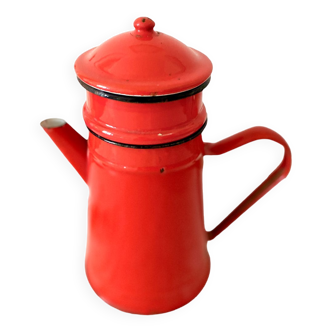Old vintage coffee pot in red enameled enamel