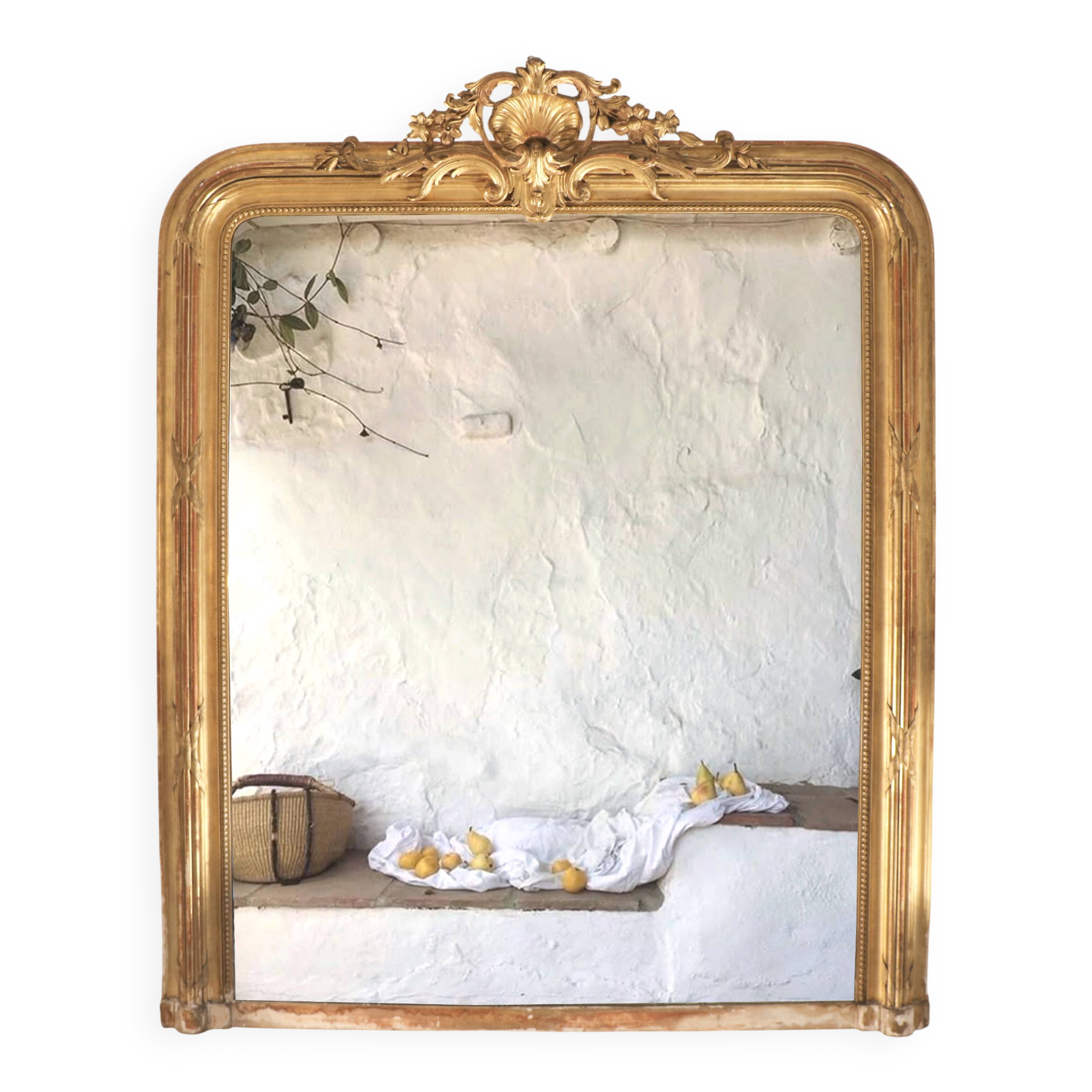 Manor house trumeau mirror in gilded wood, 19th century