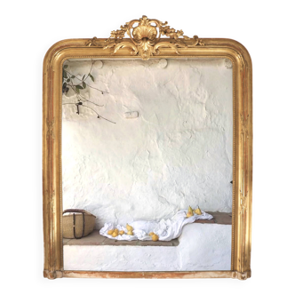 Manor house trumeau mirror in gilded wood, 19th century