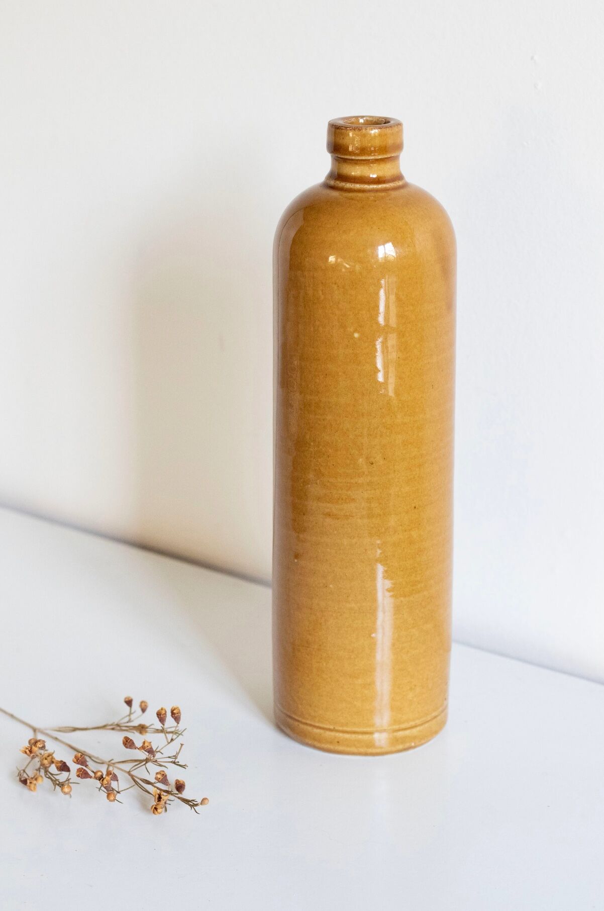 Enamelled stoneware bottle