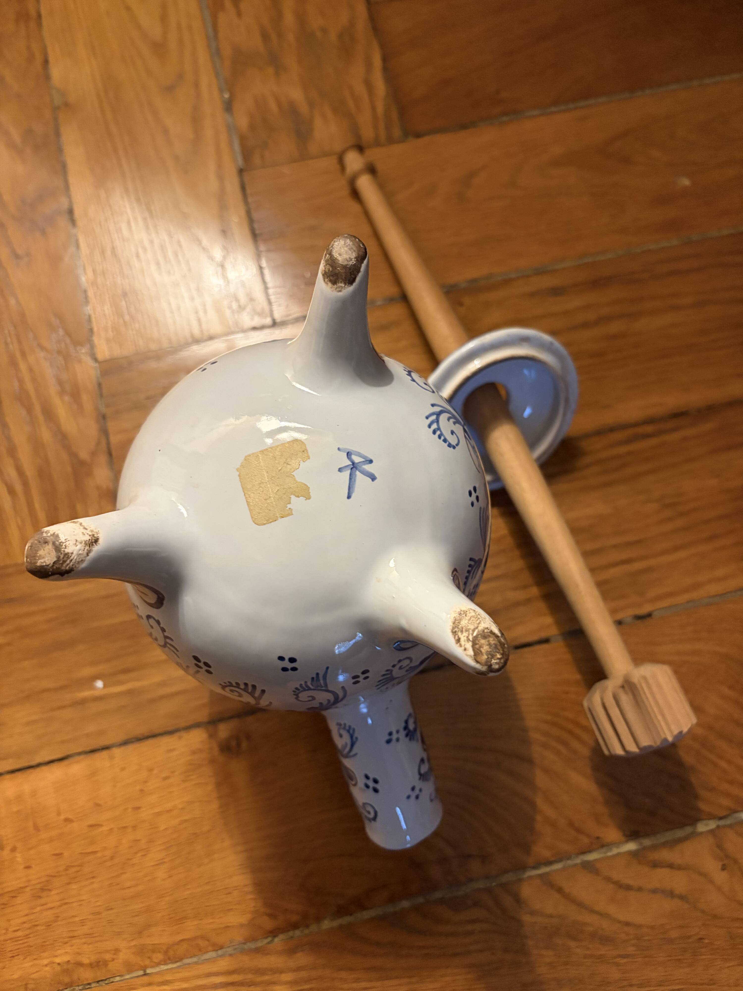 Antique chocolate pot in faience with its original whisk.