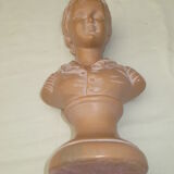 Old bust of a child in platre