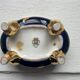 Cobalt blue and gold porcelain bonbonnière, signed JLMenau.