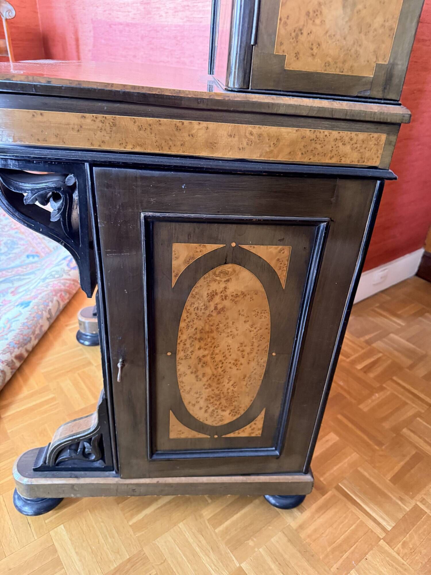 Victorian-era blackened wood and burr walnut Davenport.