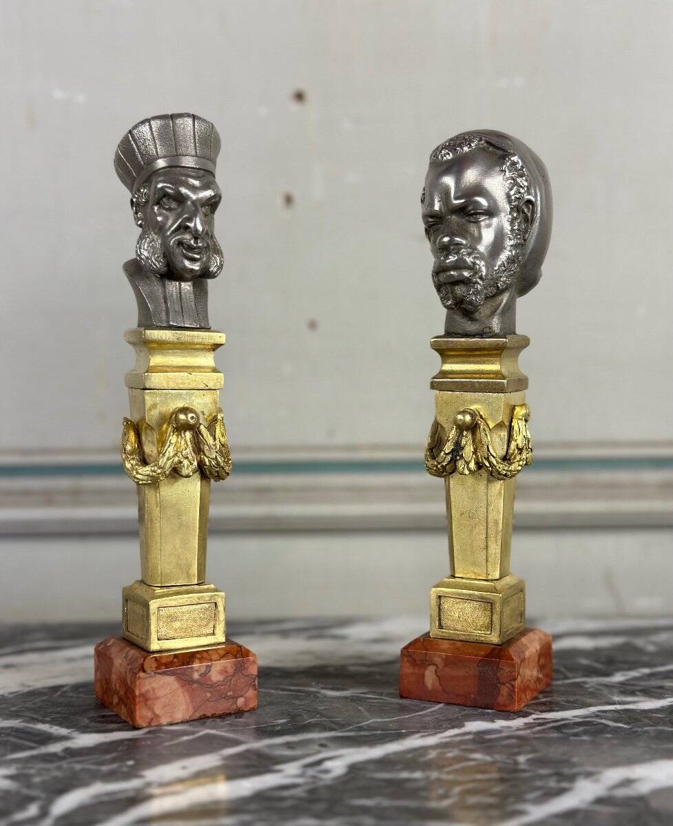 Pair of Abyssinian busts in nickel on gilded bronze and marble bases, 19th century.