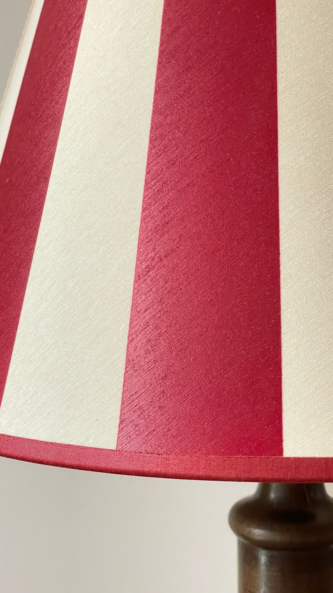 Wooden table lamp and striped lampshade