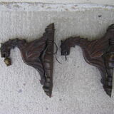 Pair of sconces with ancient dragon decoration