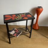 Side table or end of sofa in wrought iron and enamelled lava stone circa 1960