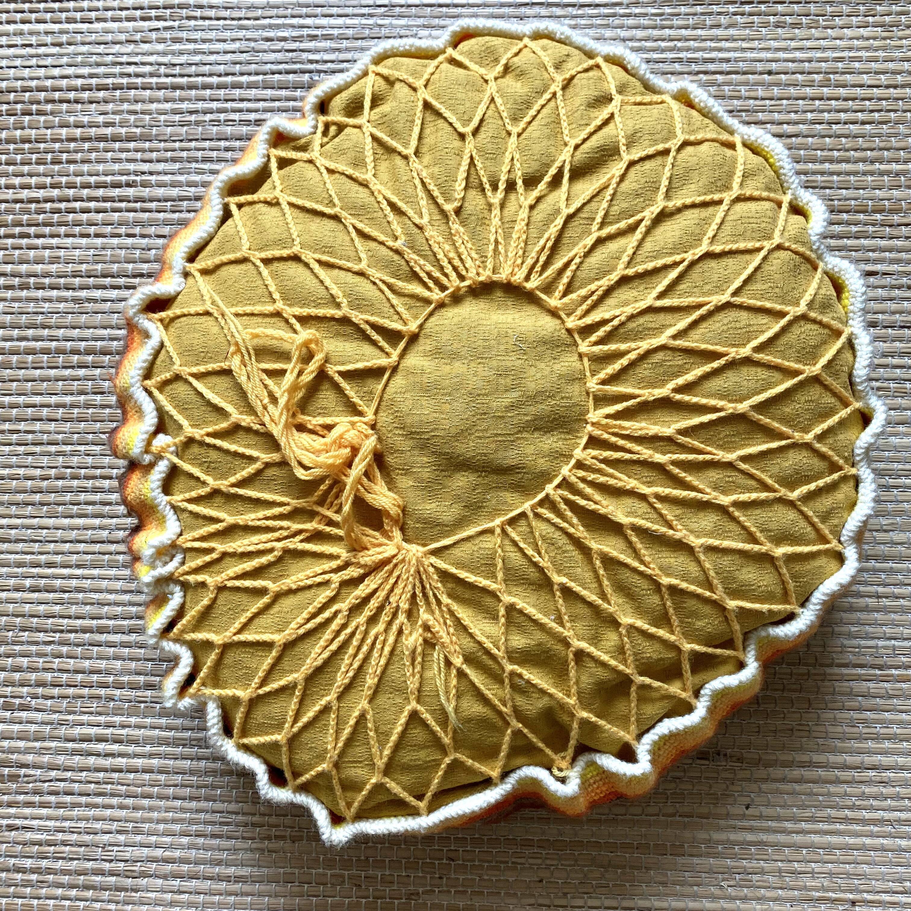 Vintage round crochet cushion