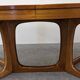 Oval extendable dining table by Baumann, France circa 1970.