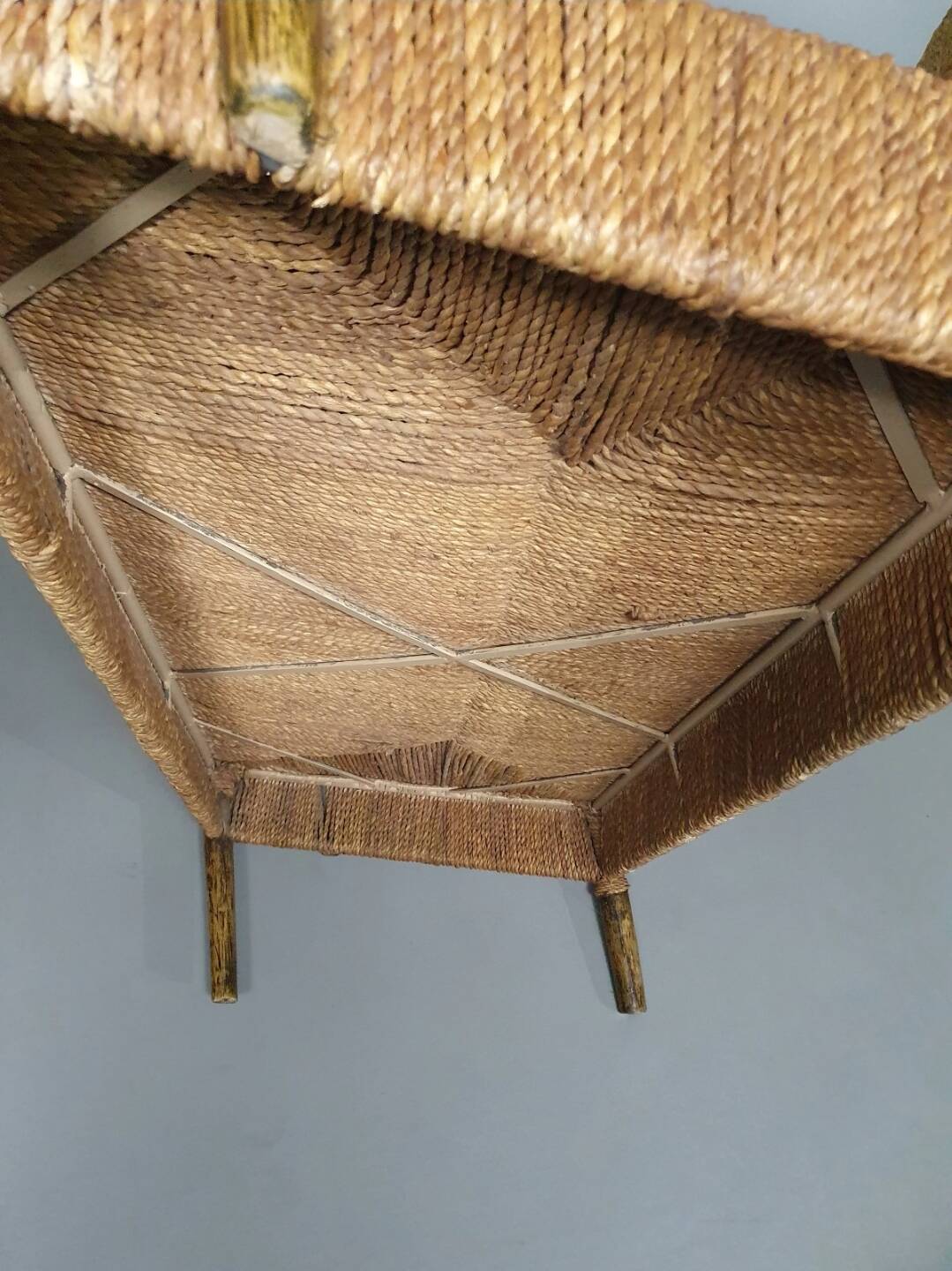 Vintage French papercord sofa with a metal frame base