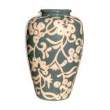 Blue water vase with white floral pattern