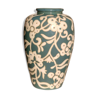 Blue water vase with white floral pattern