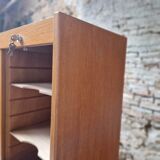 Triple curtain binder cabinet