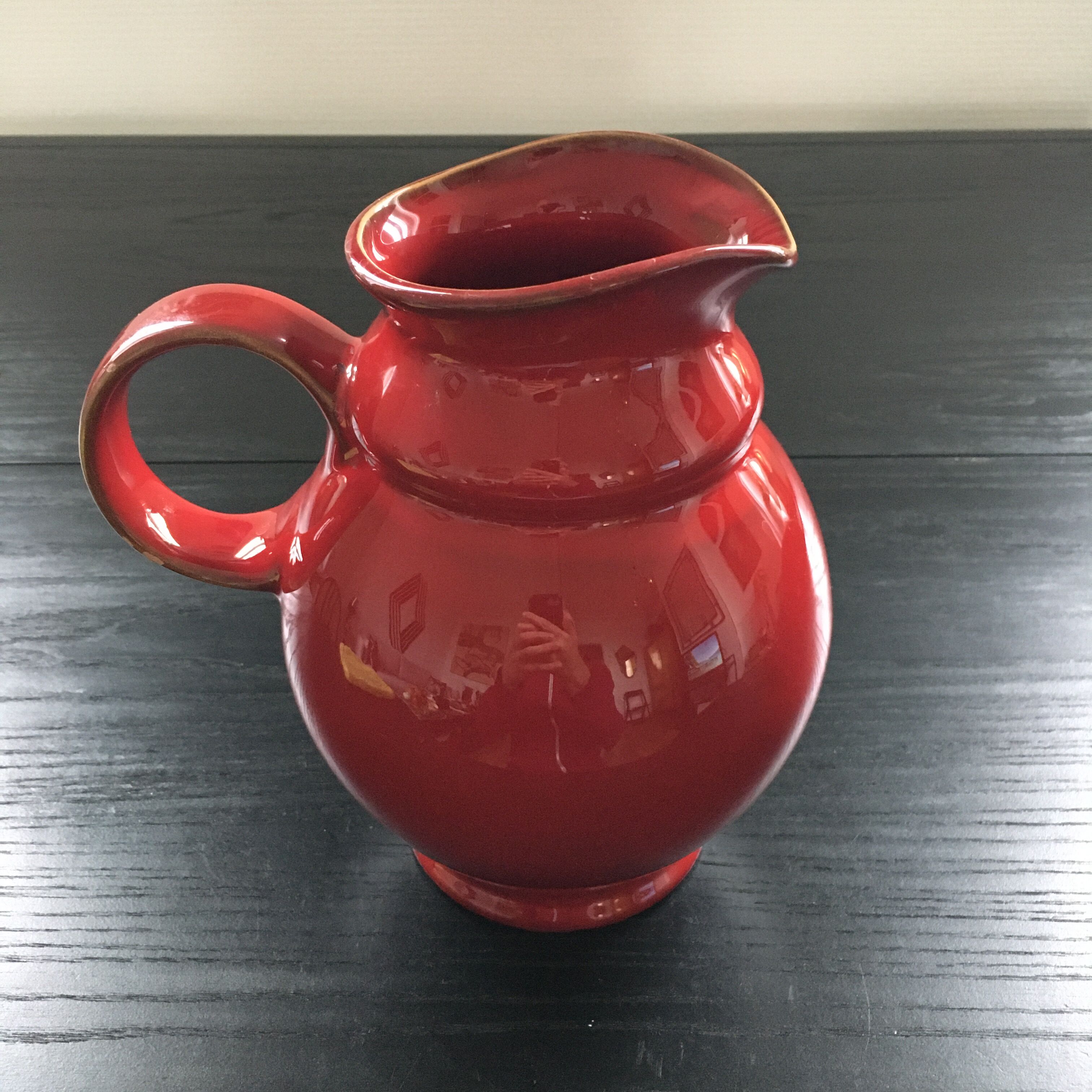 Dark red pitcher