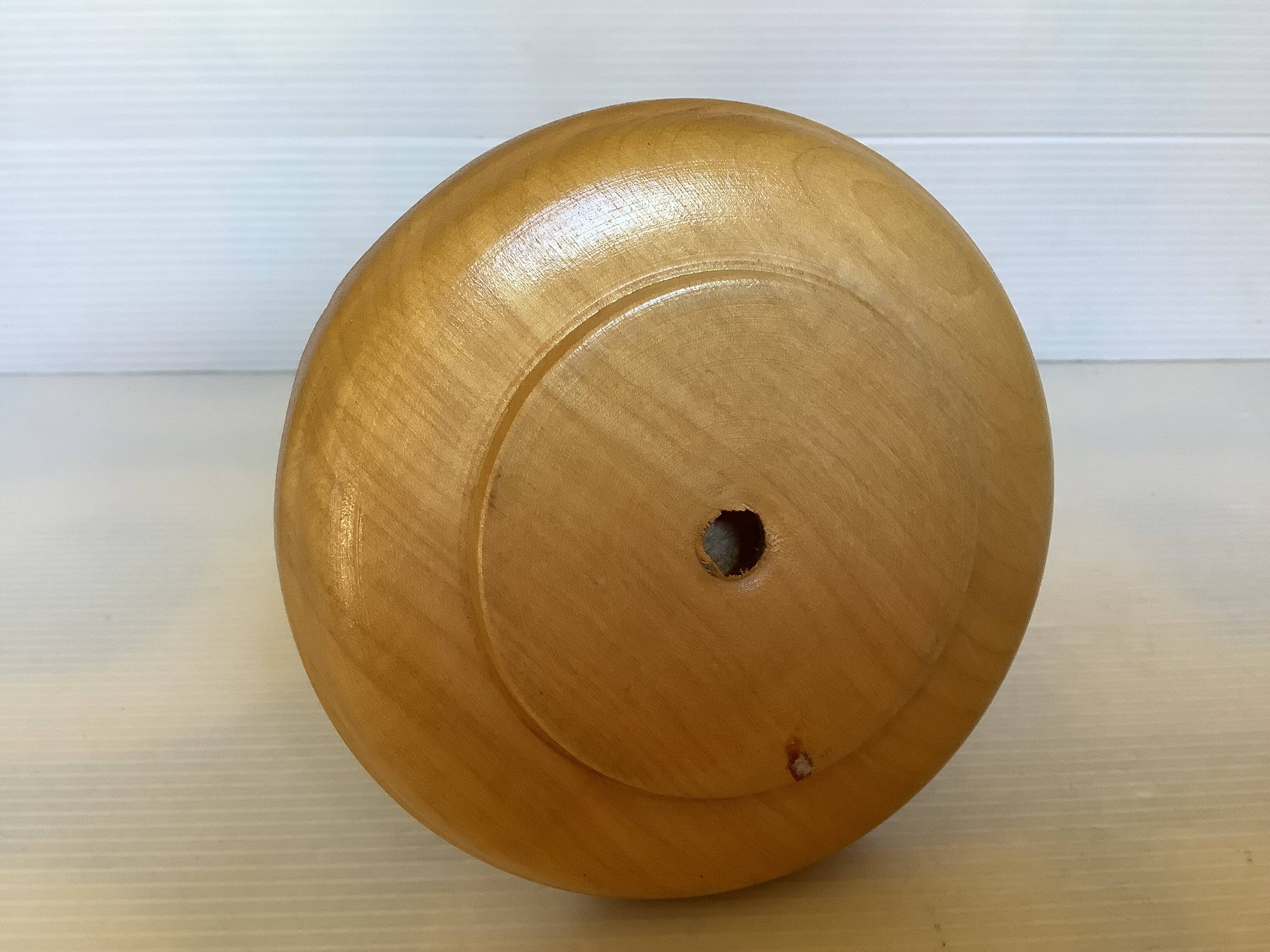 Carved wooden candle holder