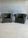 Title: Pair of vintage olive green leather Chesterfield armchairs