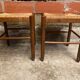 Pair of vintage wooden stools with woven straw seats