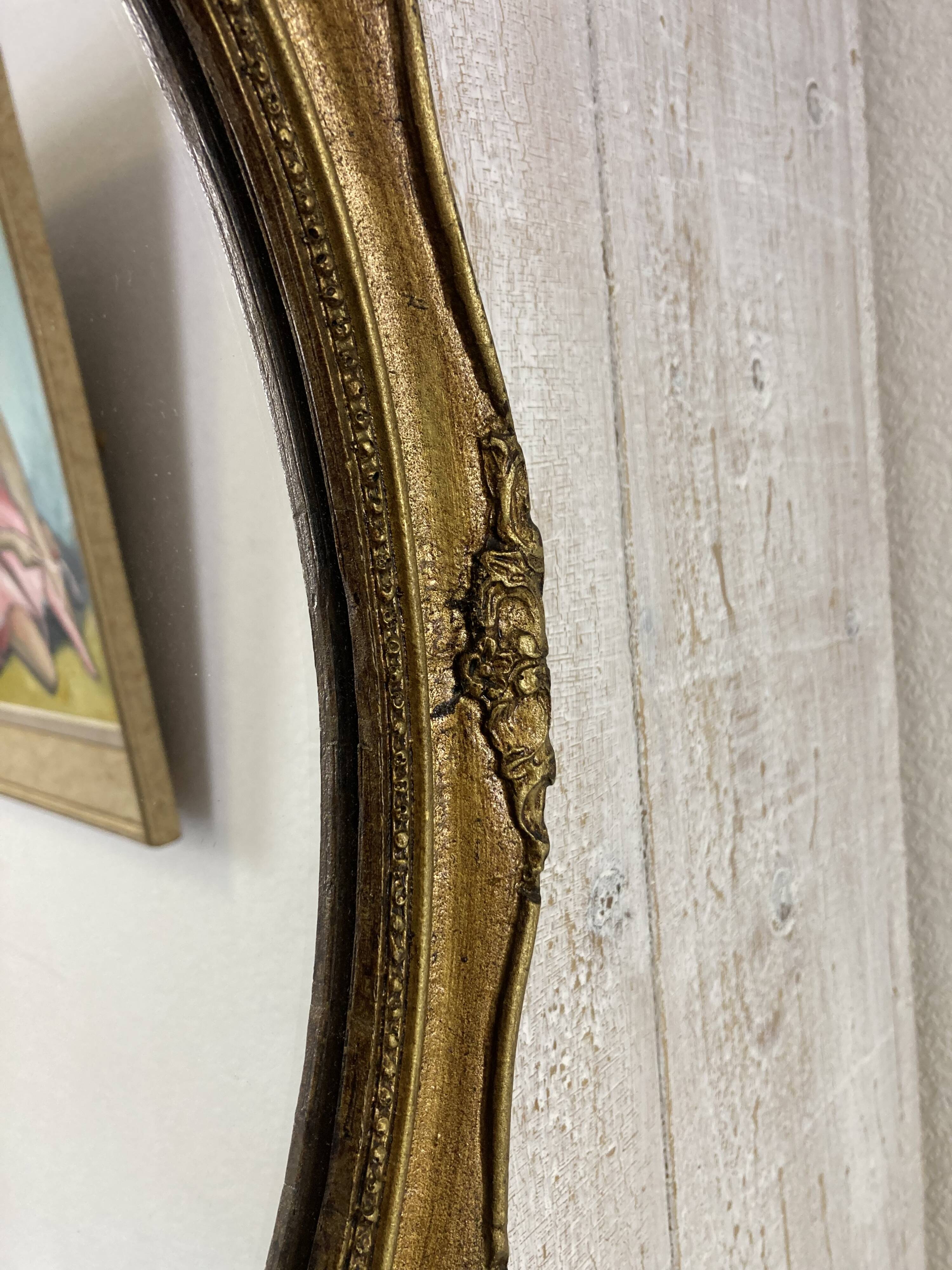 Antique oval mirror
