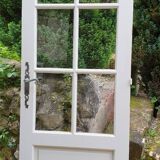 Old wooden door with small squares
