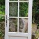 Old wooden door with small squares