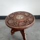 Tabouret de chasse en bois sculpté à décor de vignes