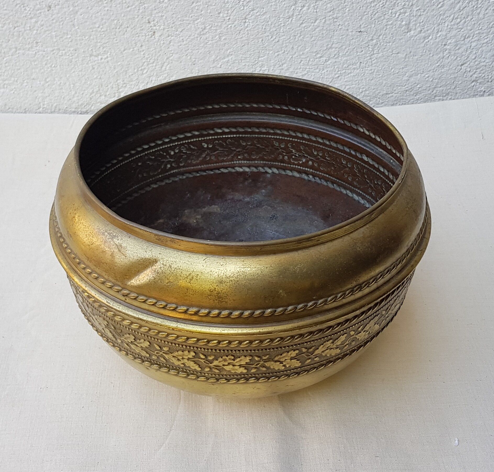 Brass pot cover