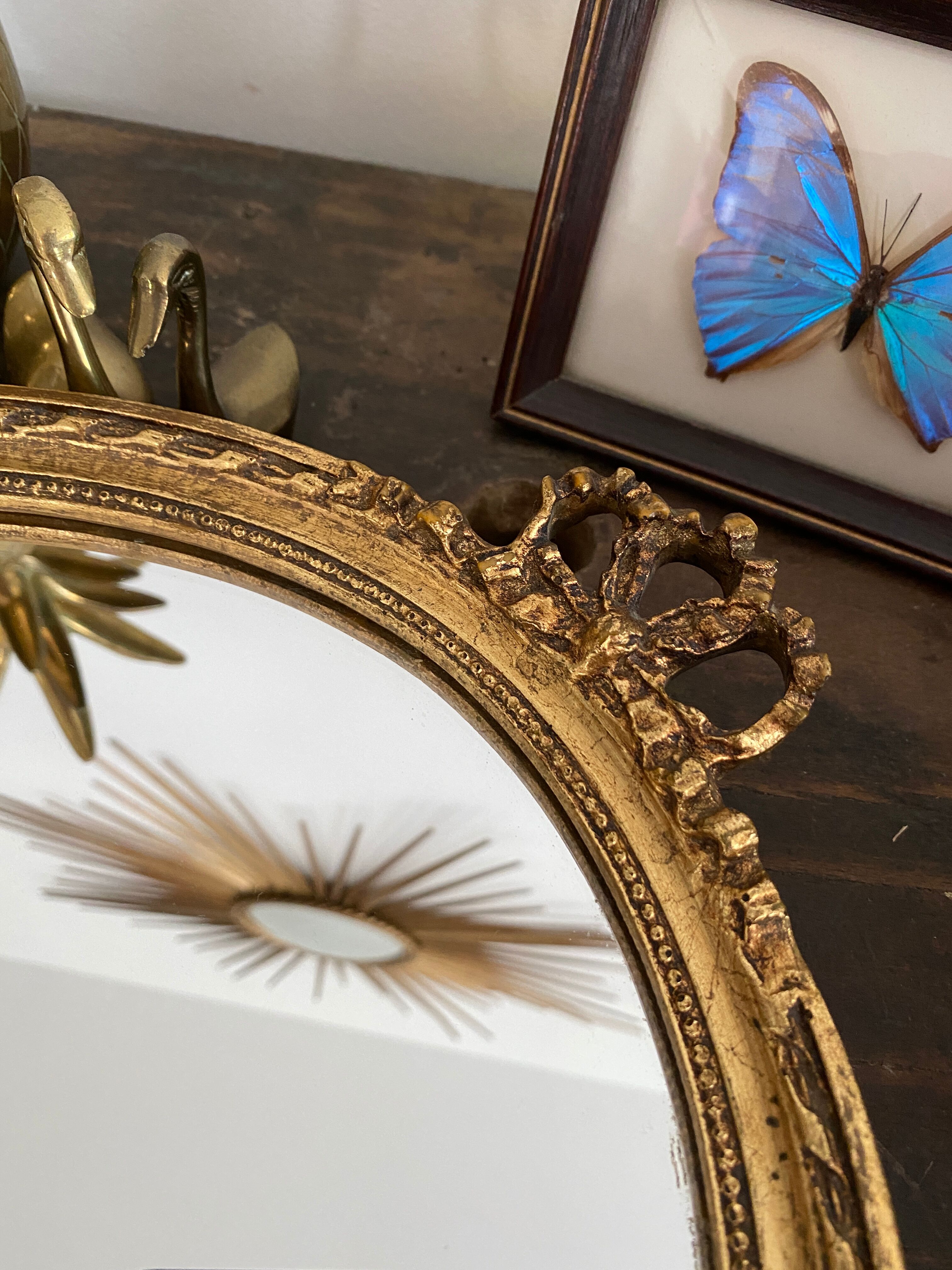 Golden oval mirror 32x44cm