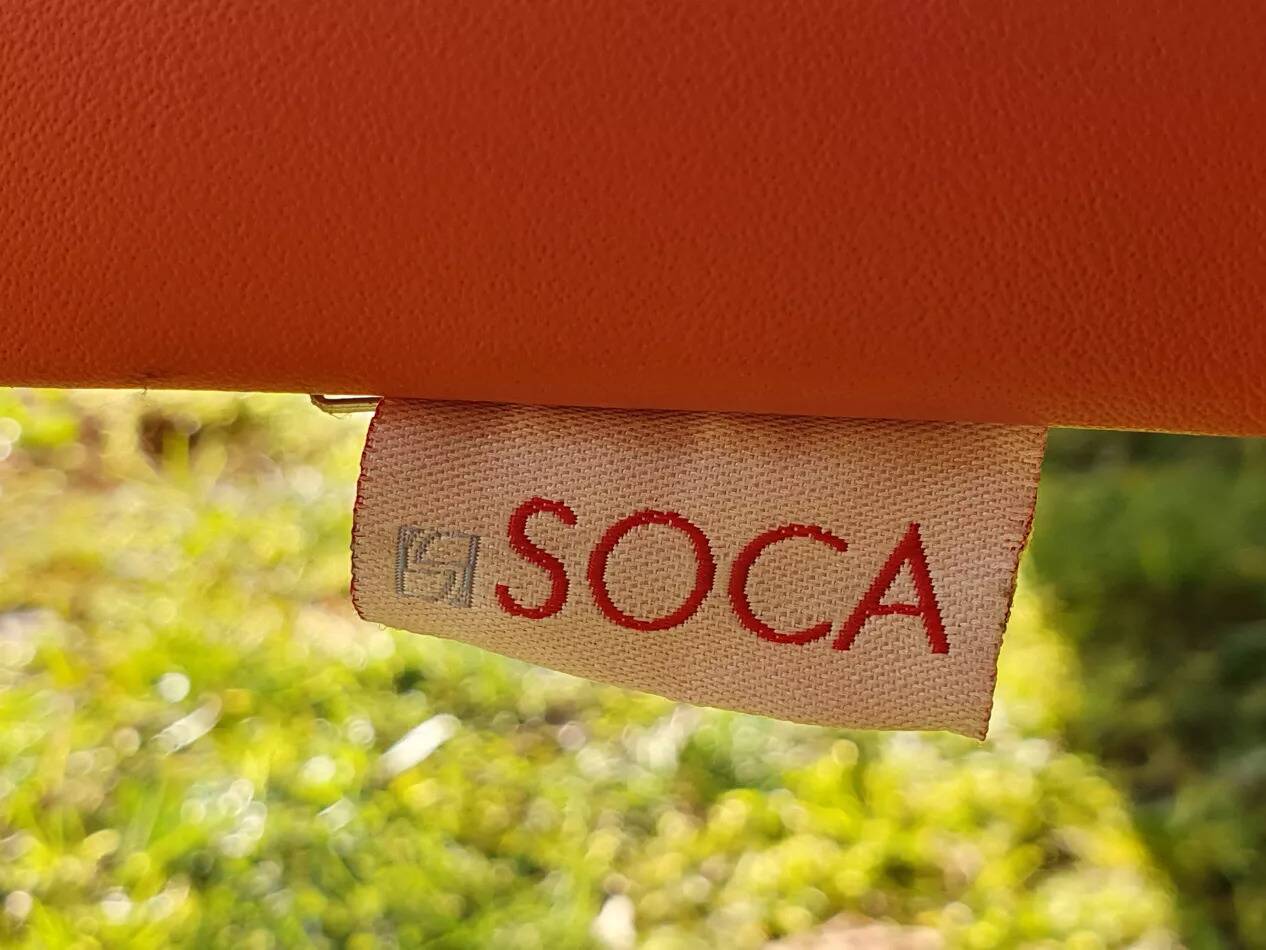 14 armchairs and 4 vintage orange leather benches