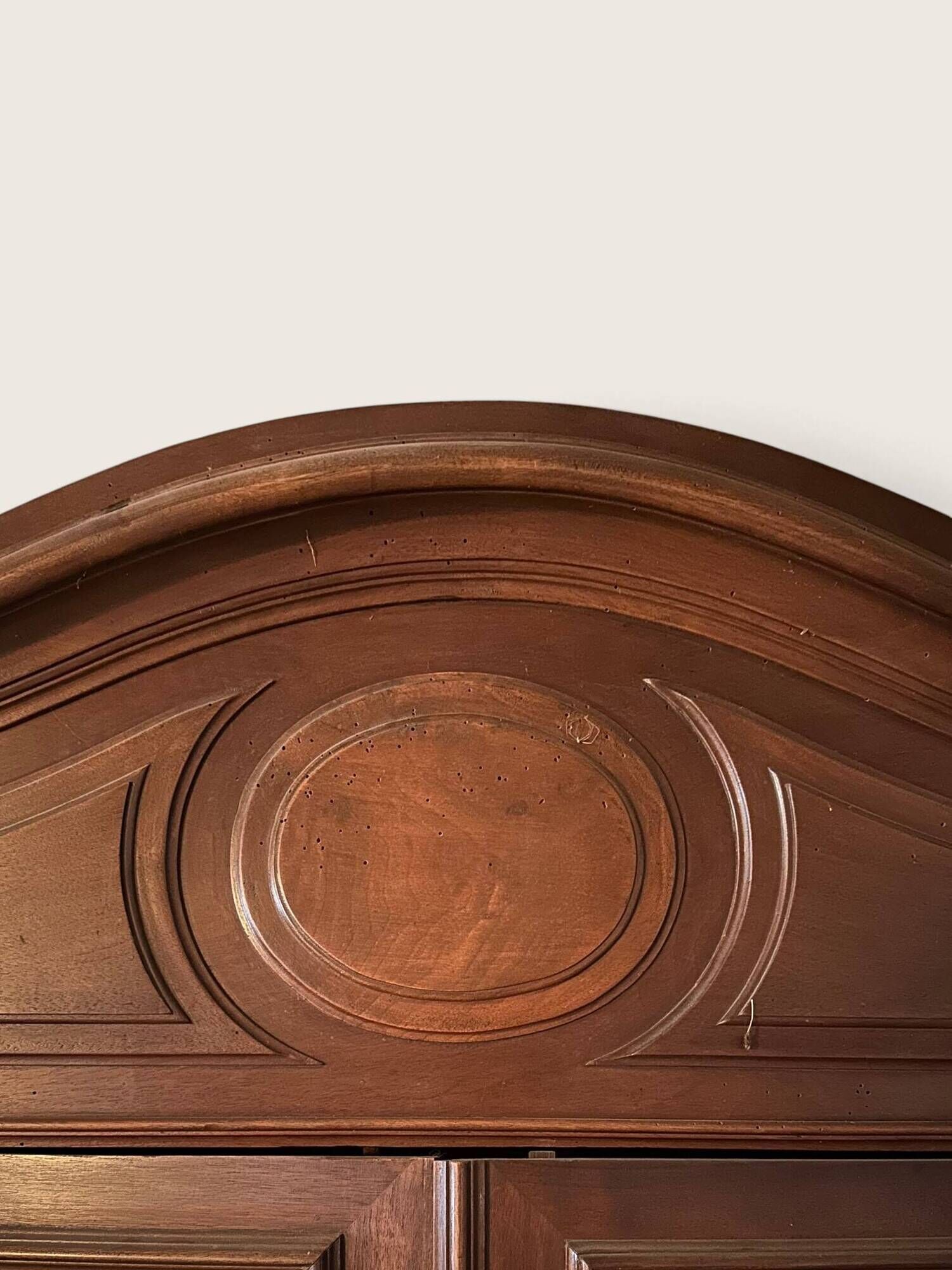 Louis XV style armoire with two bevelled mirror doors.